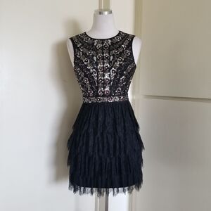 bebe Black Sequin and Lace Mini,  sz. 4, NWOT